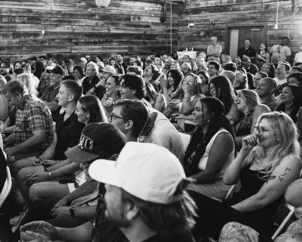 Audience laughing at live comedy event in Knoxville Tennessee